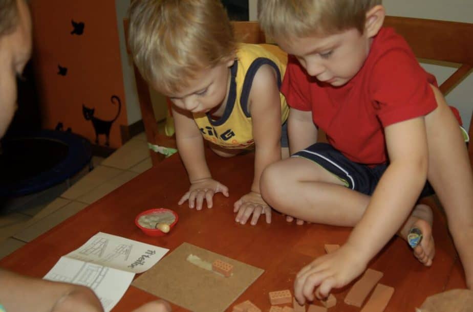 boys building bricks