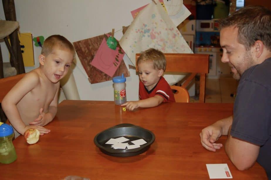 family of boys playing math game