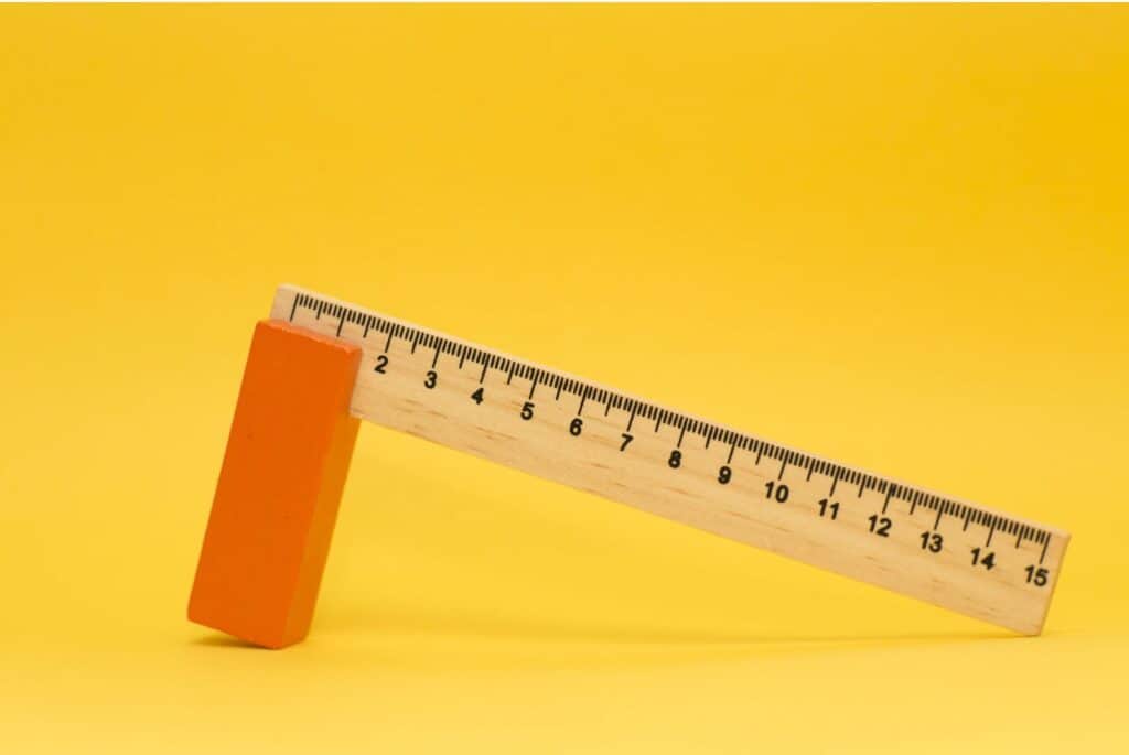 wood ruler with yellow background
