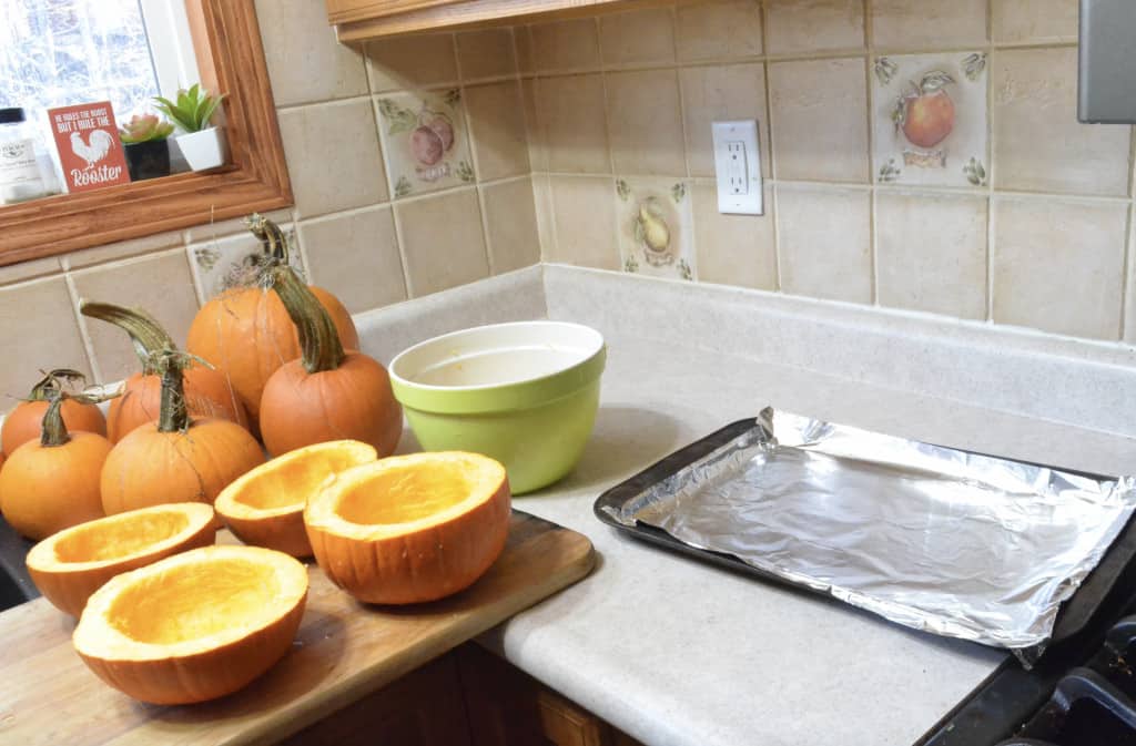 taking out pumpkin seeds in kitchen