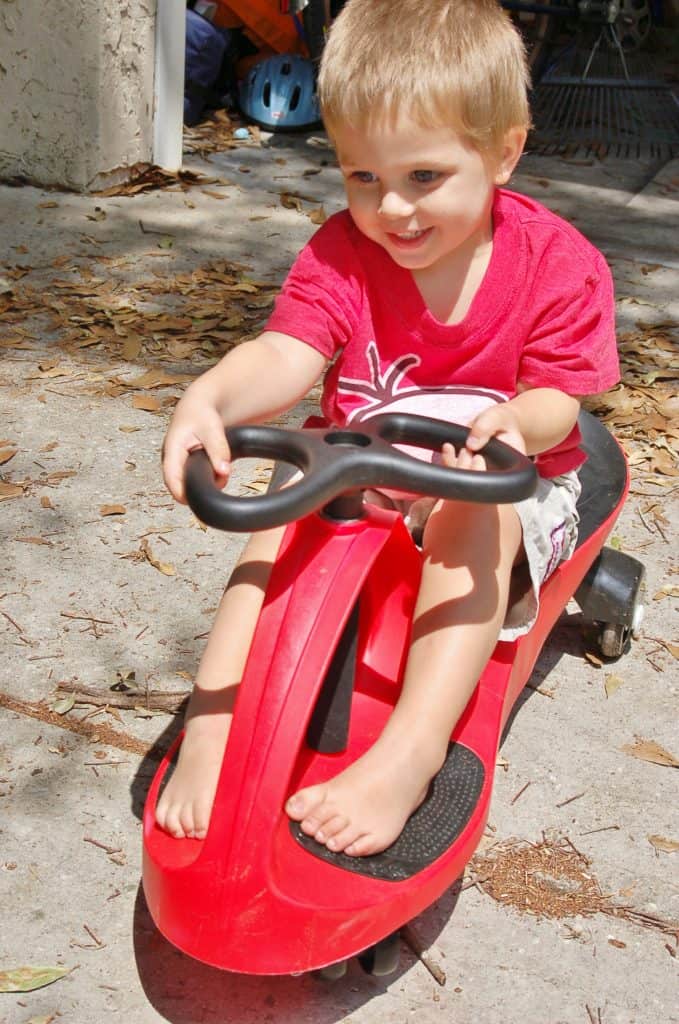 boys riding a plasmacar