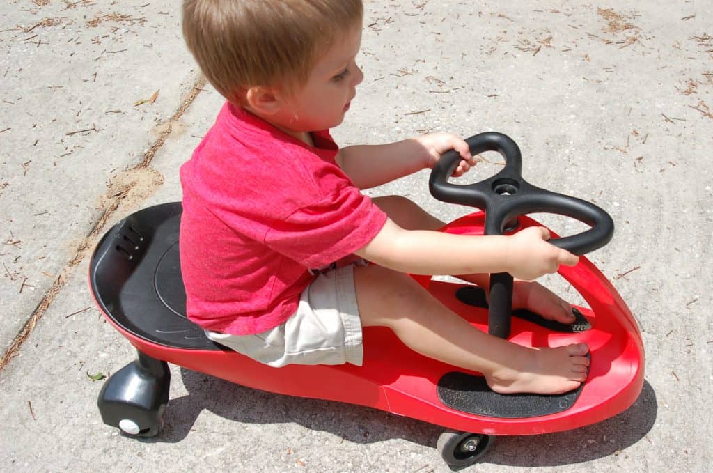 boy riding a Plasmacar