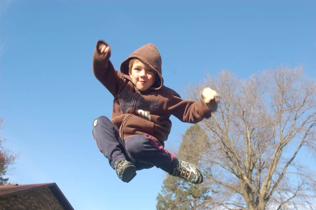 boy jumping in the air