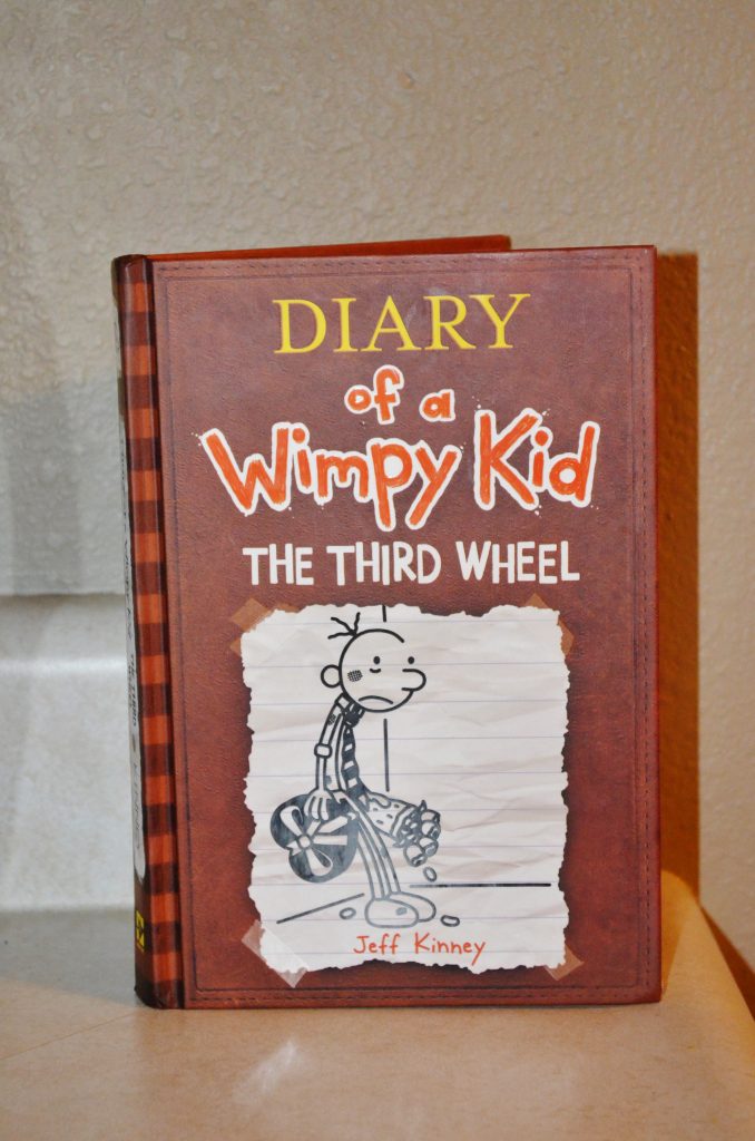 book review diary of a wimpy kid the third wheel