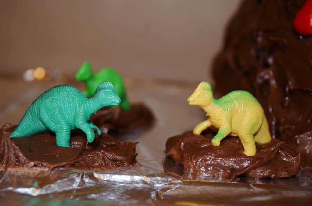 dinosaurs on a chocolate volcano cake tutorial