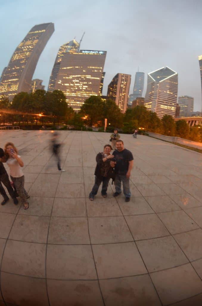 couple reflection in the bean chicago