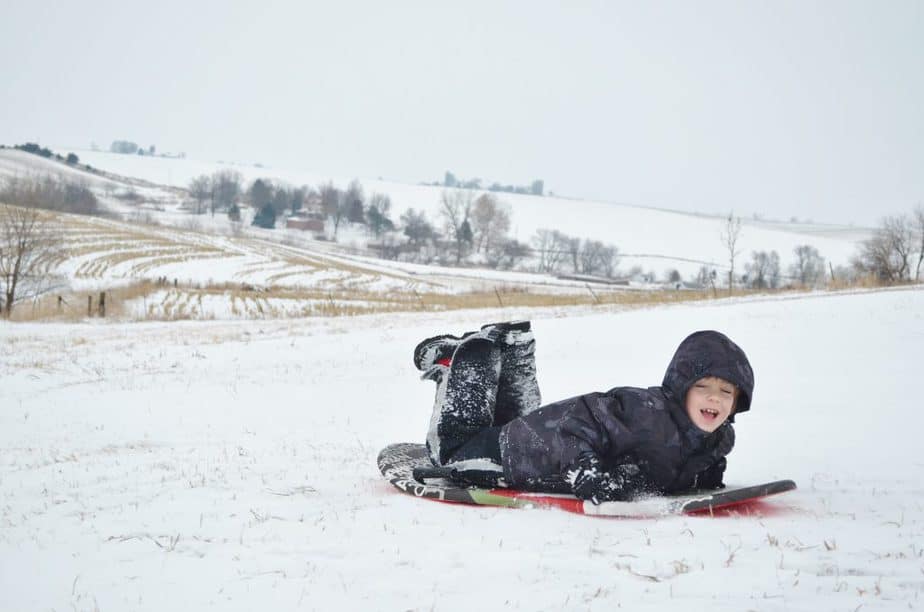 sledding in the snow