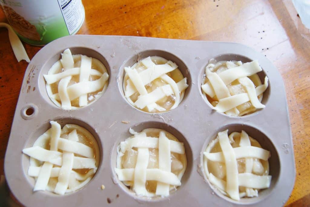 mini apple pies in metal baking tin