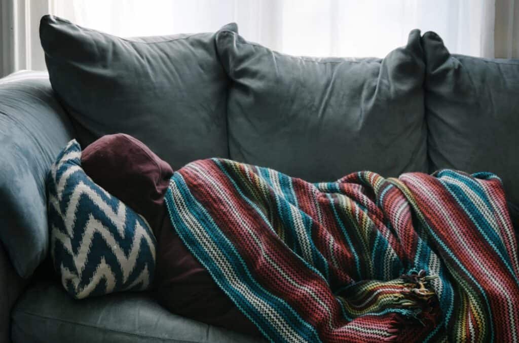 teen sleeping on couch