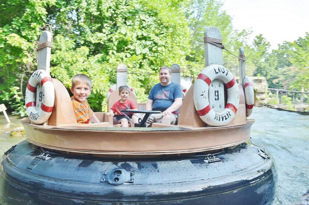 family riding river rapids branson