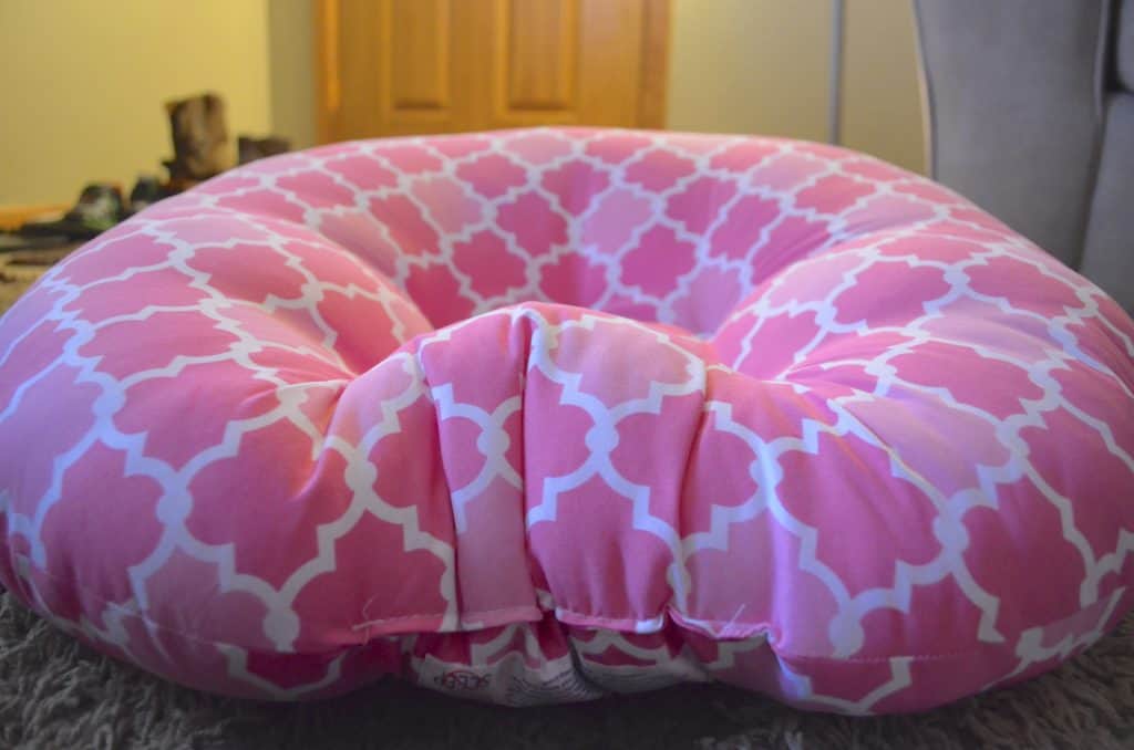 pink Boppy newborn lounger