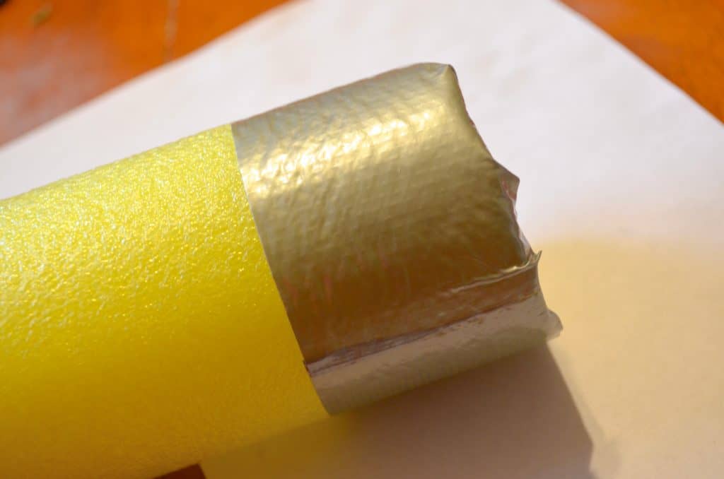 yellow pool noodle with silver duct tape