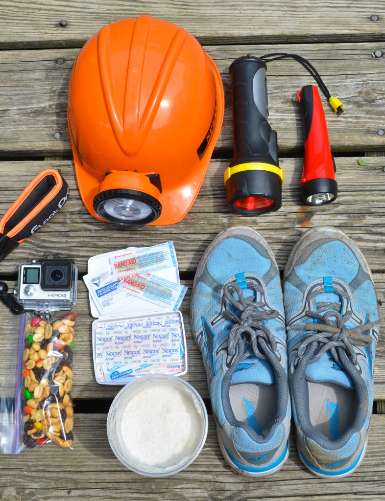 adventure packing shoes, flashlight and first aid