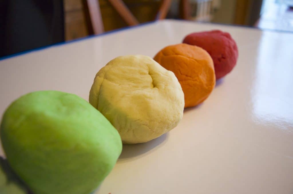 four balls of homemade play dough