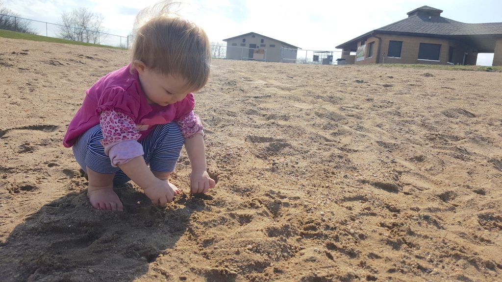 Keeping Hands Sanitized the Easy Way - toddler playing at the beach