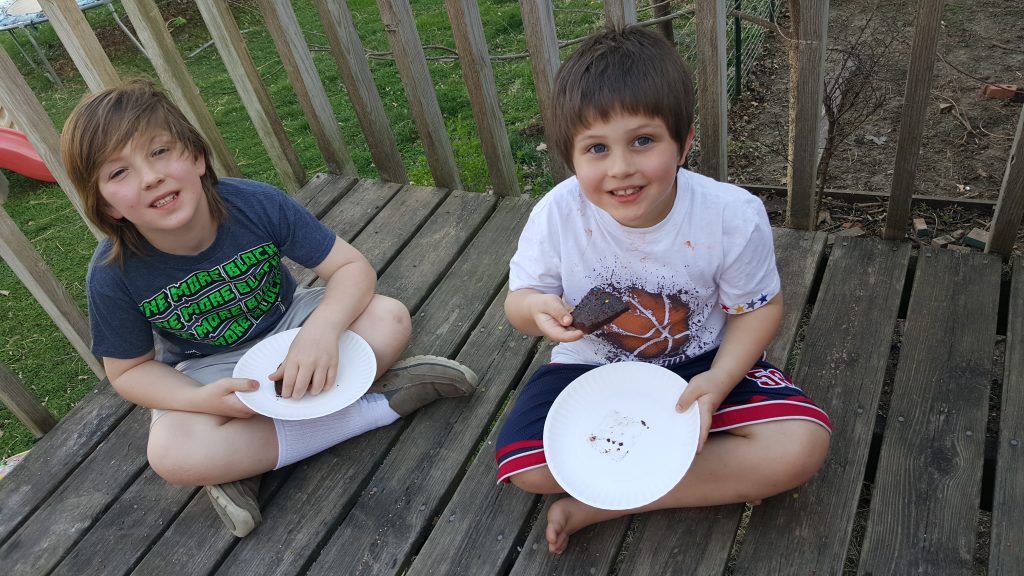 Brownies over the Campfire: Making Family Memories - Just cut a half of a Pillsbury Brownie Mix box in half, mix in your cast iron pan, and bake over the campfire!