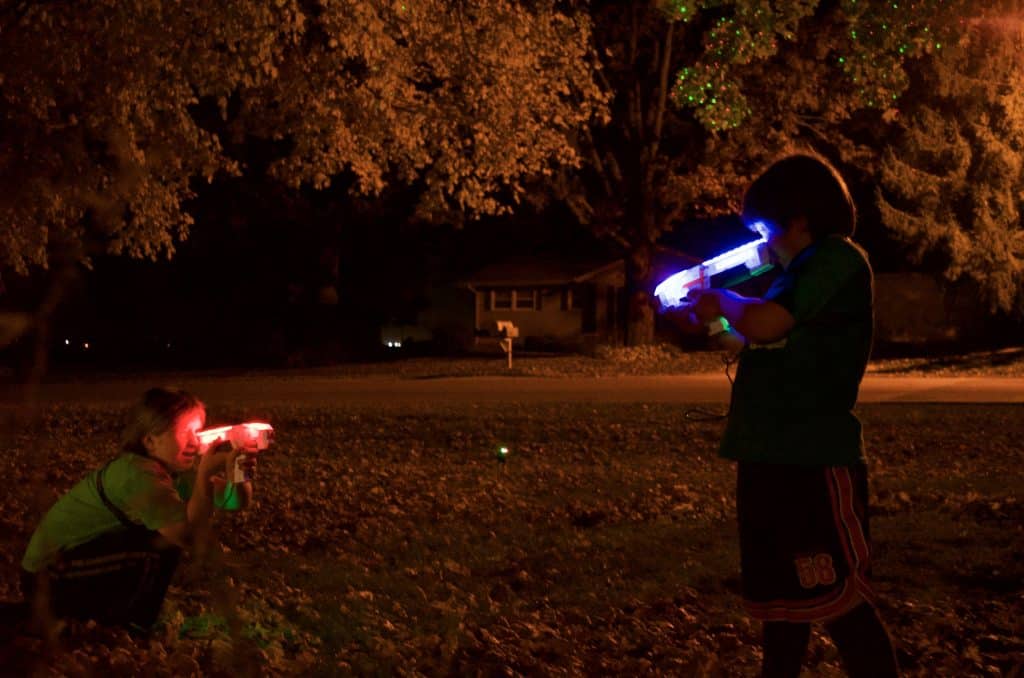 two boys playing LaserX Laser Tag Game