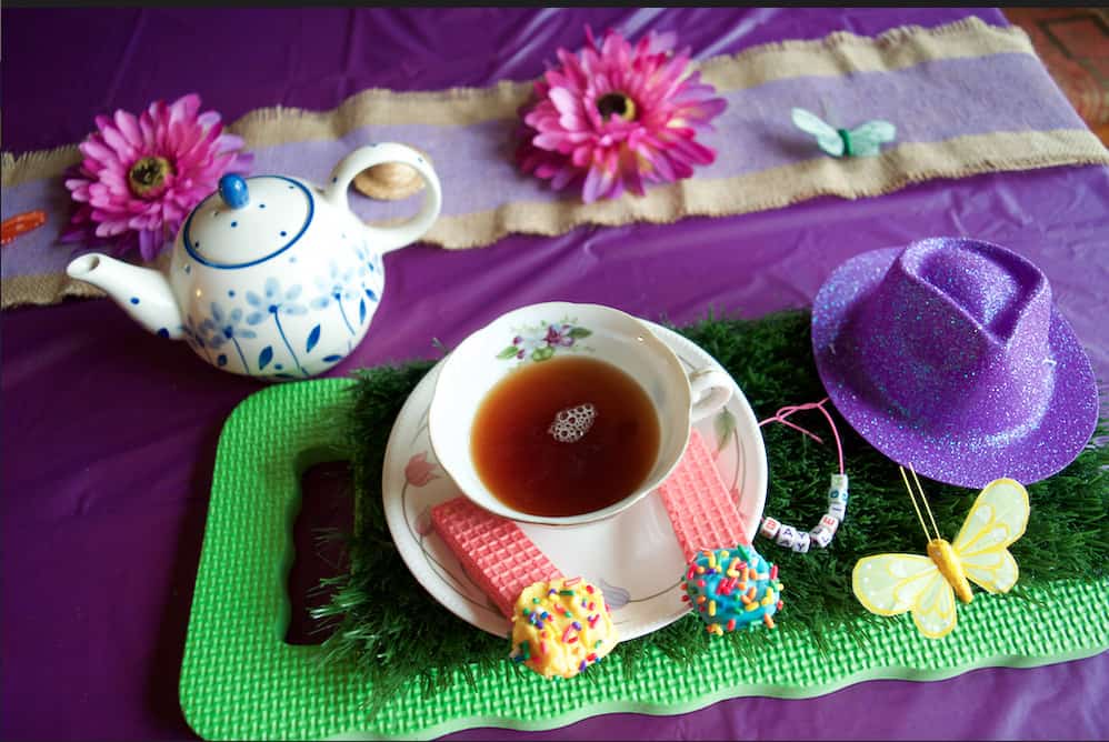 purple magical tea party place setting