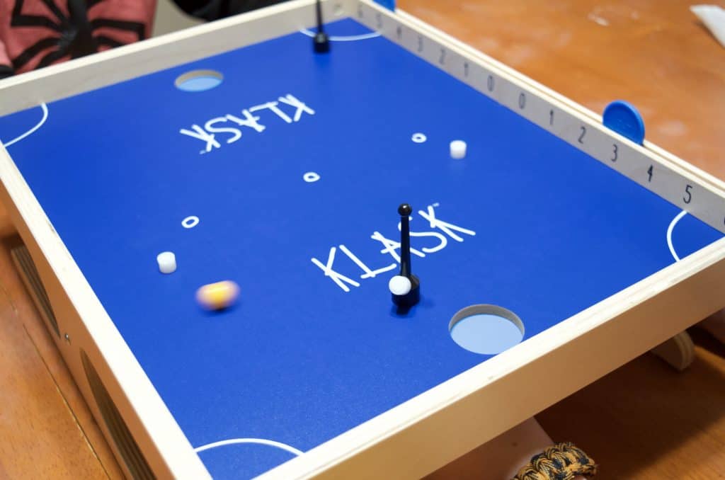 Klask Game board with game pieces