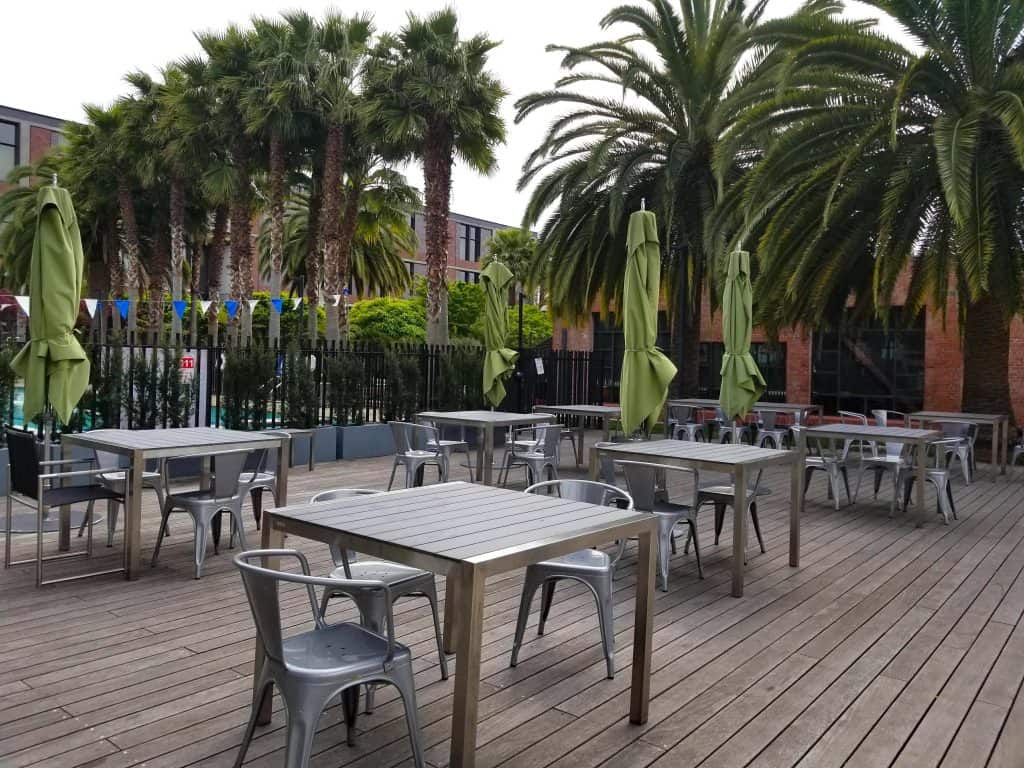 wooden tables and chairs outside