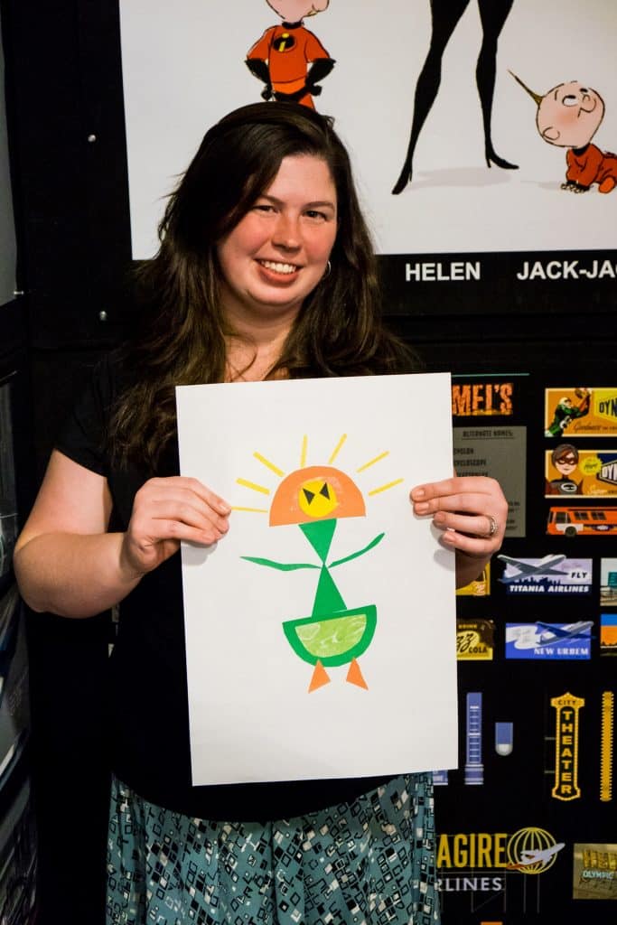 woman holding superhero craft