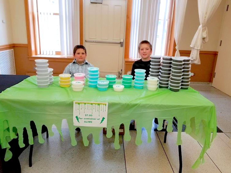 two boys kid entrepreneur selling slime