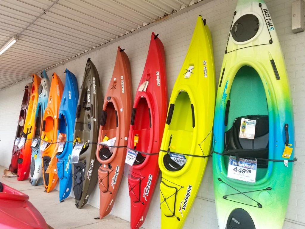 row of colorful kayaks at Theisen's