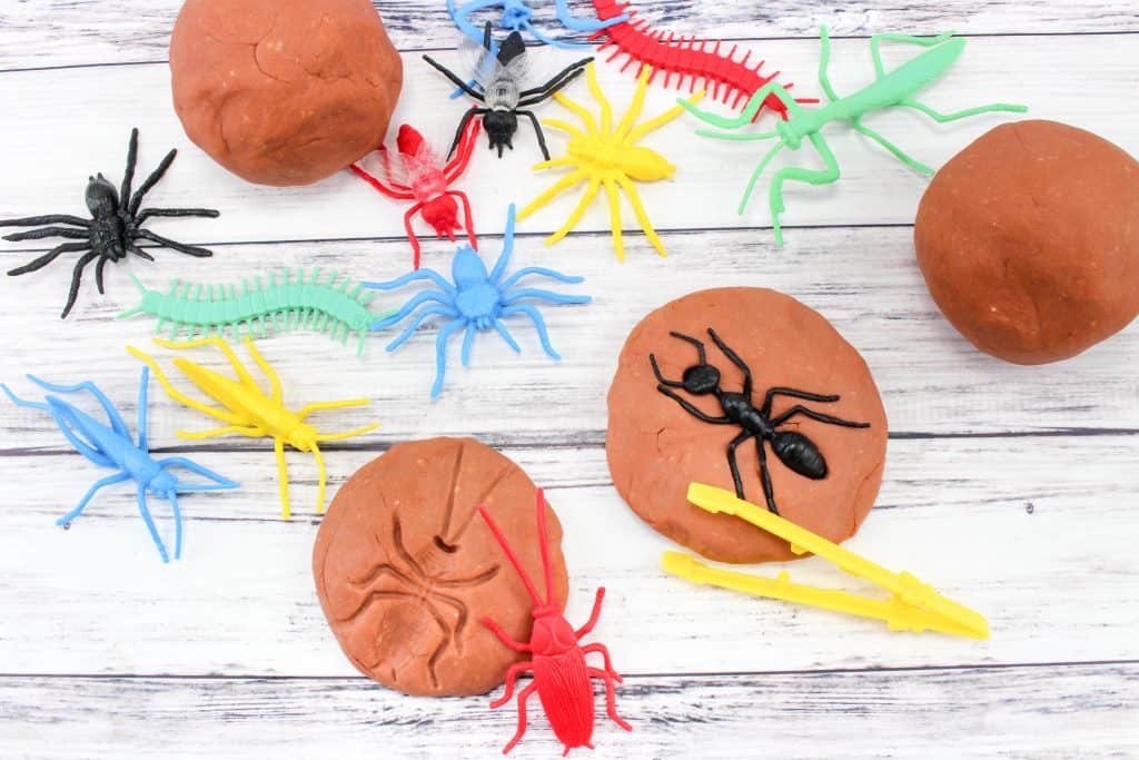 fossil play dough with pretend play bugs