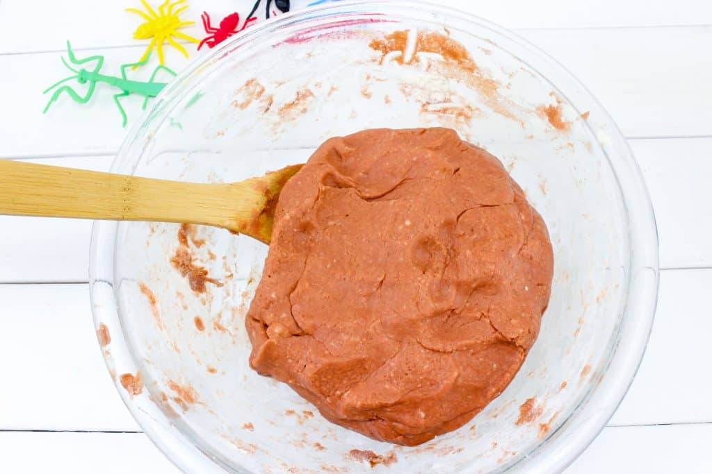 mixing homemade play dough in bowl