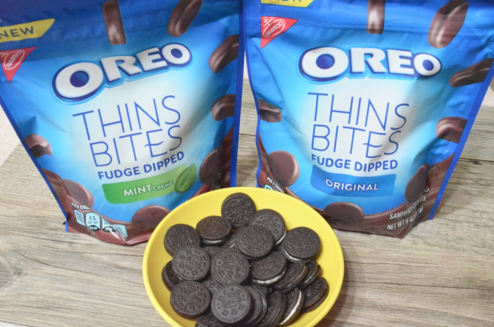 two bags and plate of OREO Thins Bites cookies