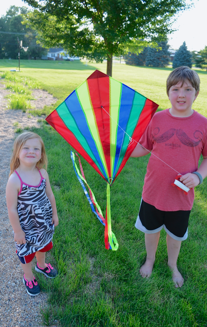 boy and girl with kite