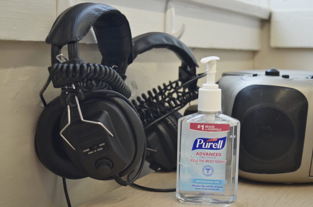 classroom headphones and PURELL hand sanitizer