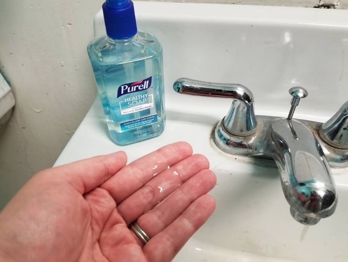 washing hands with PURELL Healthy Soap in sink