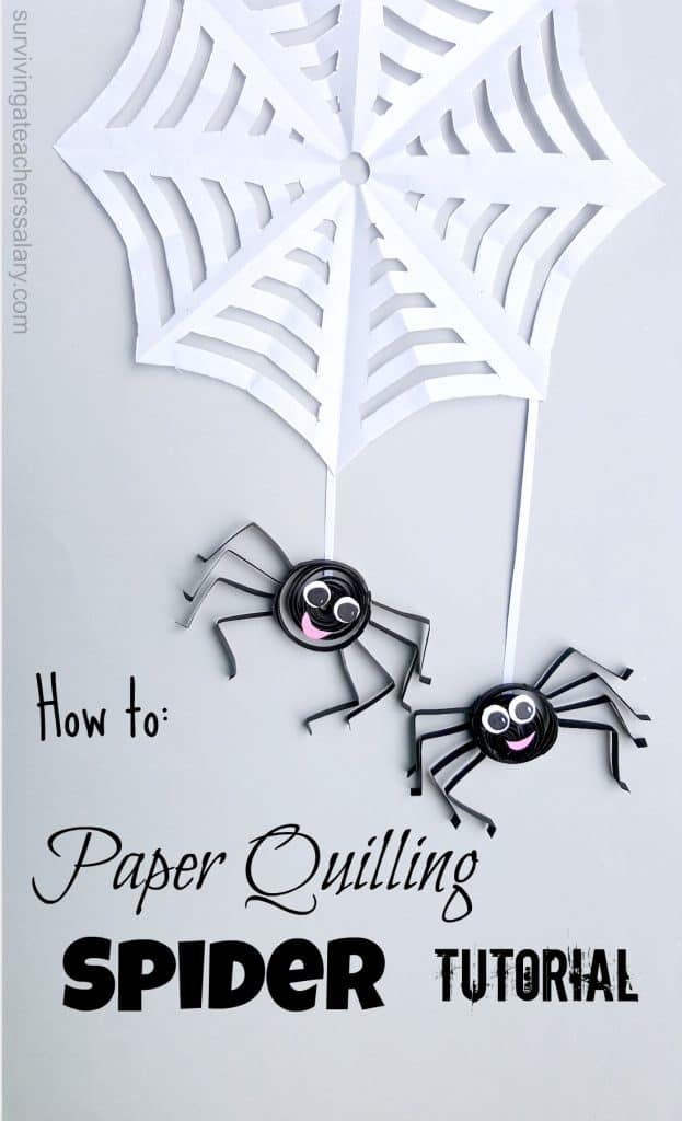 two paper quilled spiders on web