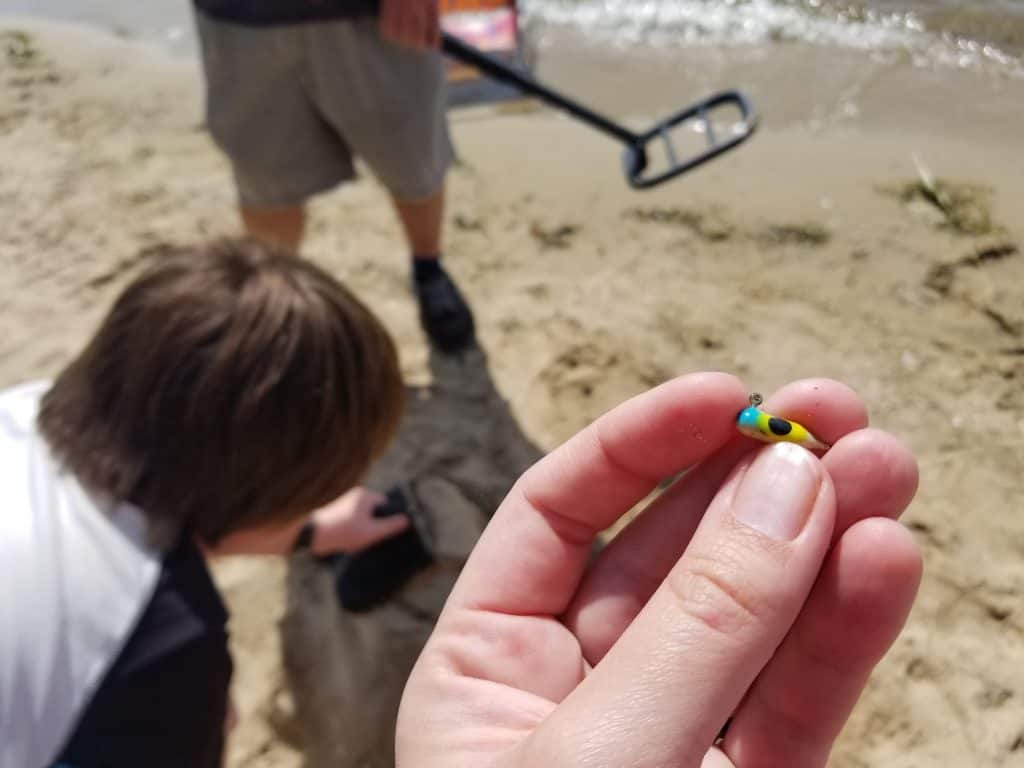 metal detecting on the beach