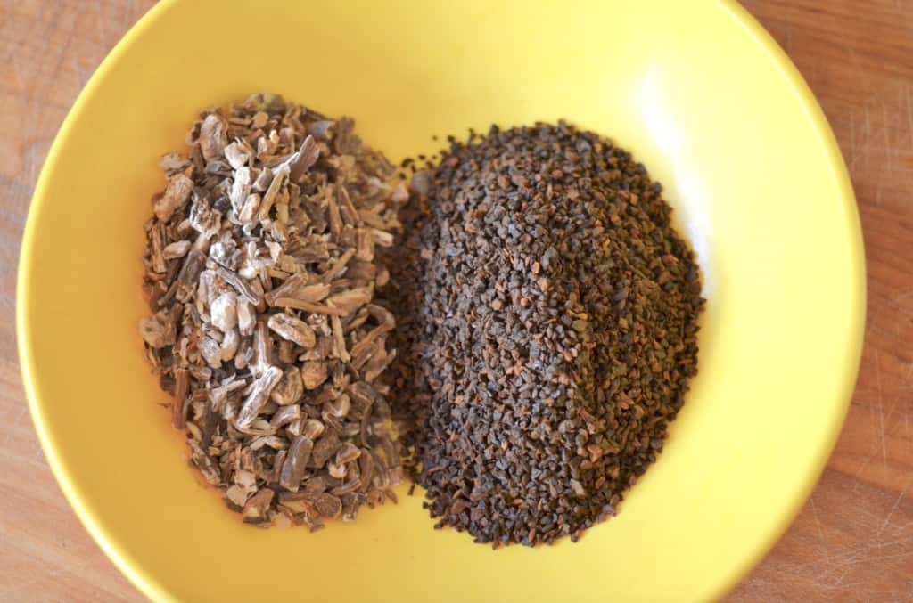 small yellow bowl of dandelion root and chicory root