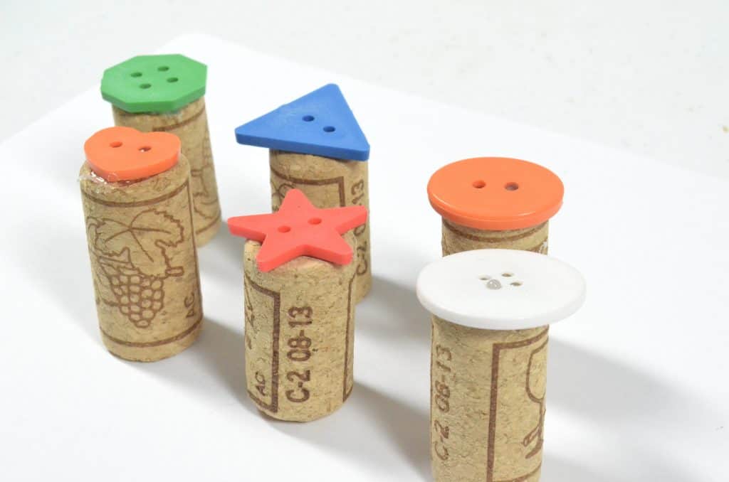 button and wine cork art stamps