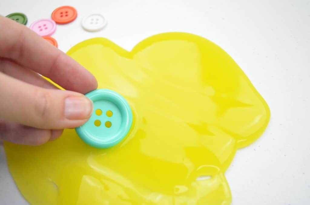 green button and yellow slime