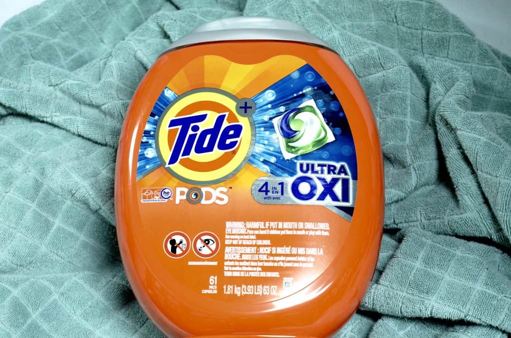Tide PODS Laundry Detergent on bath towel
