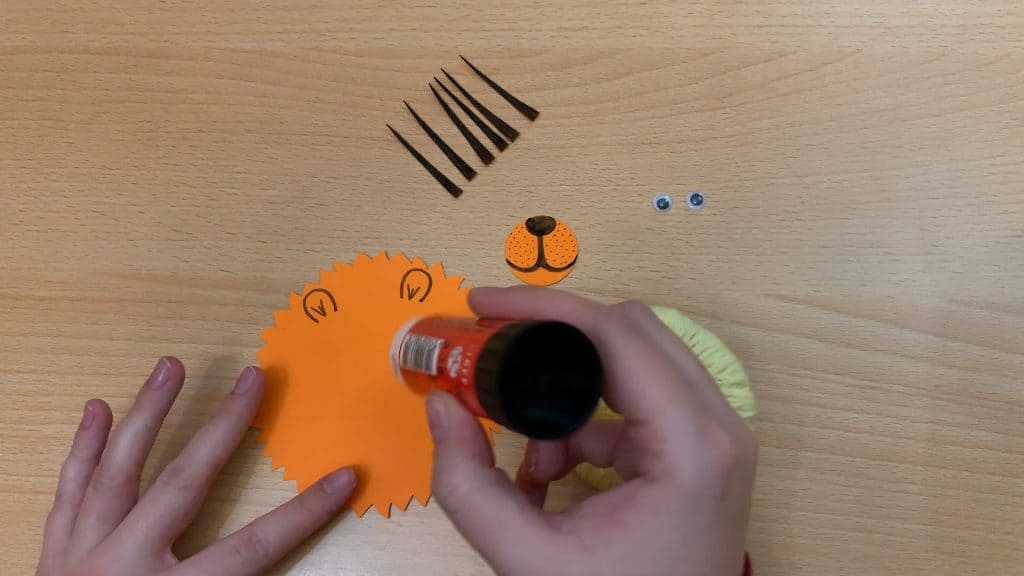 glueing nose on lion craft