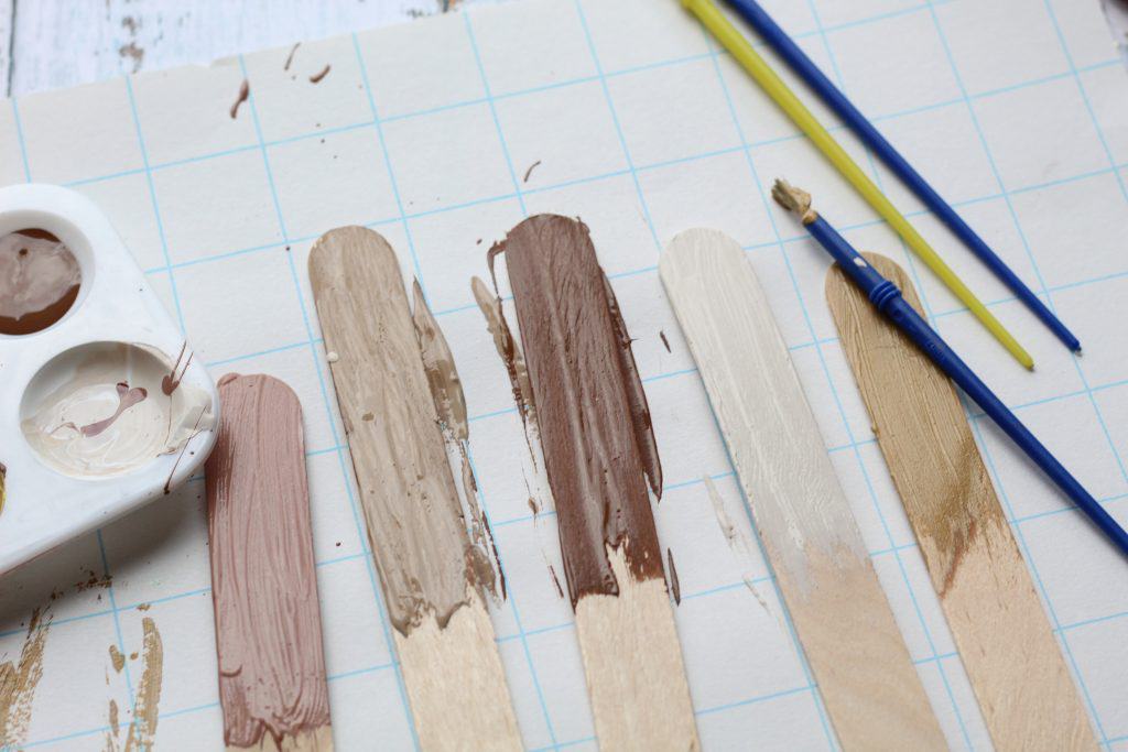 painting multicultural skin craft sticks