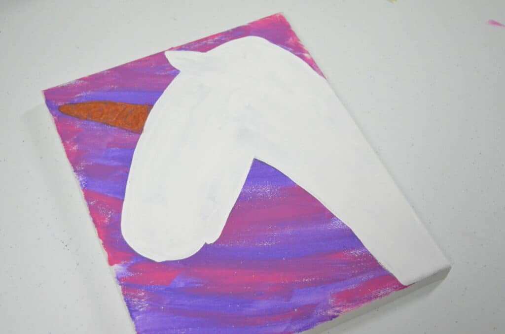 white unicorn painted on canvas