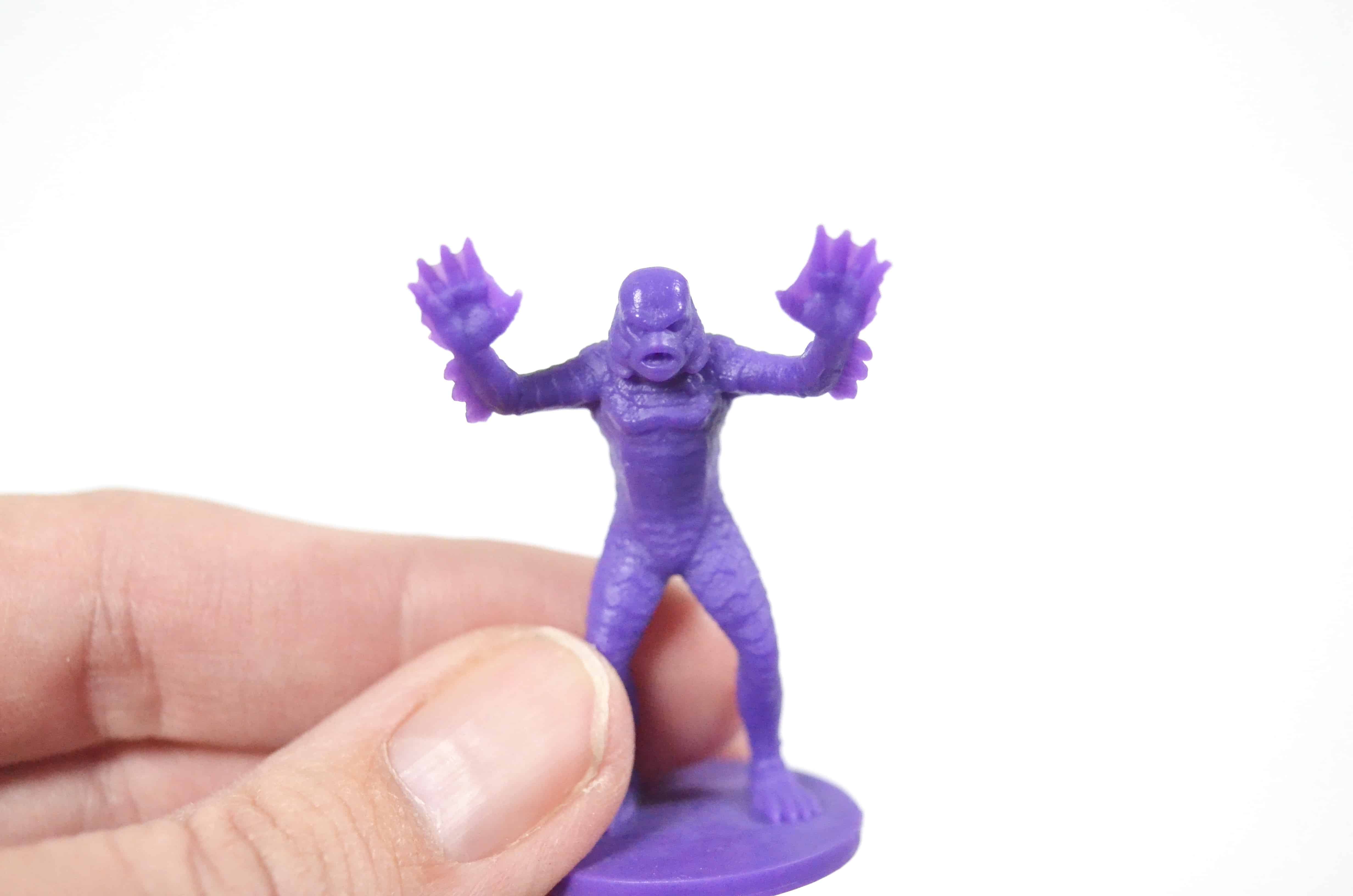 purple swamp creature game piece horrified universal monsters game