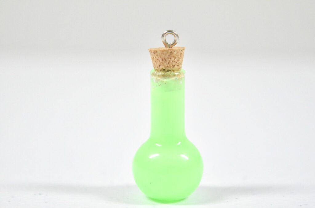 small glass potion bottle glow in the dark necklace