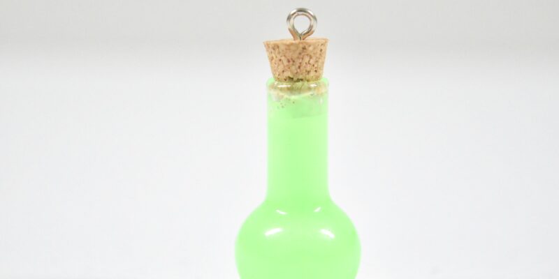 small glass potion bottle glow in the dark necklace