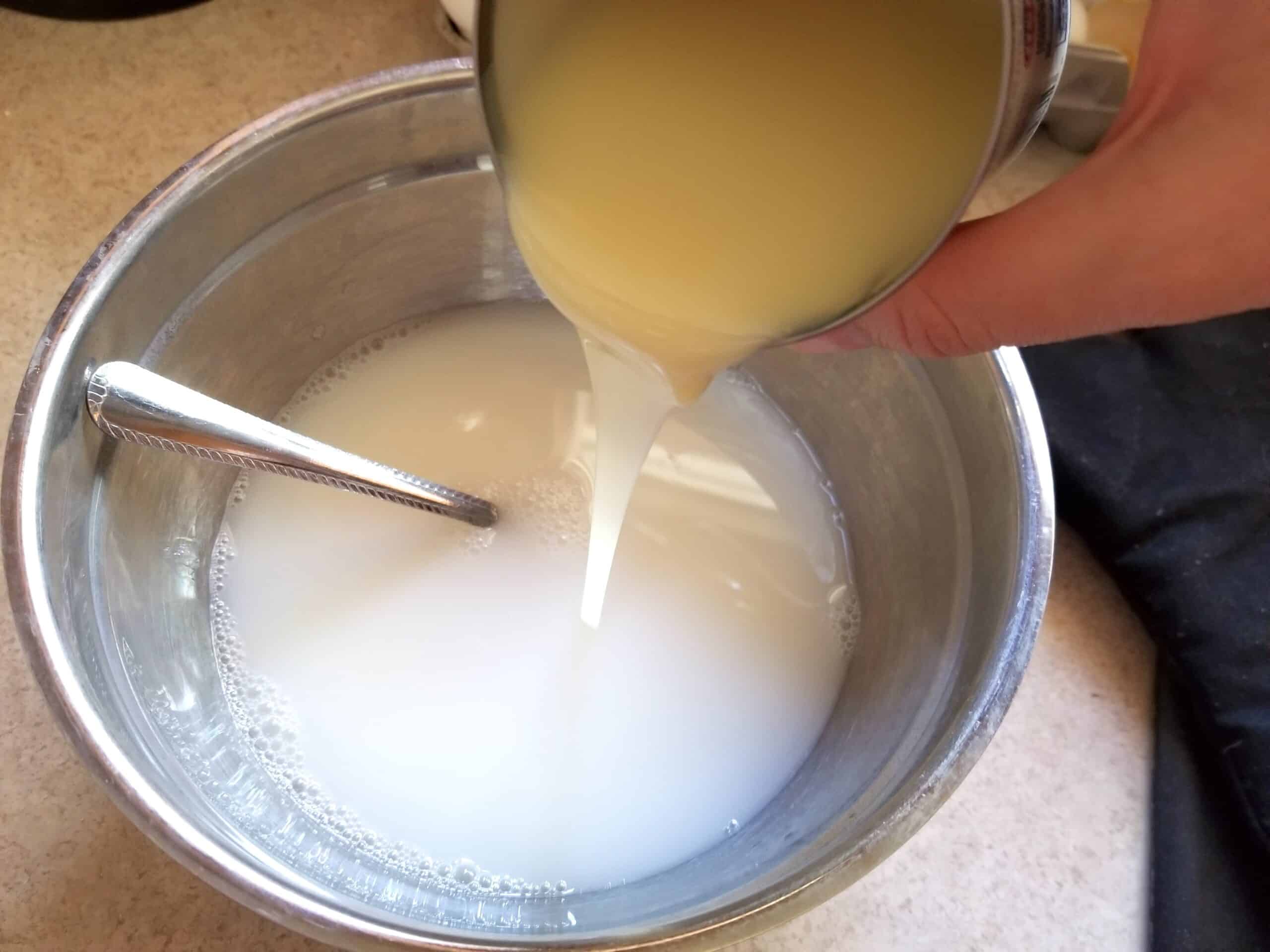pouring jello ingredients mix in bowl
