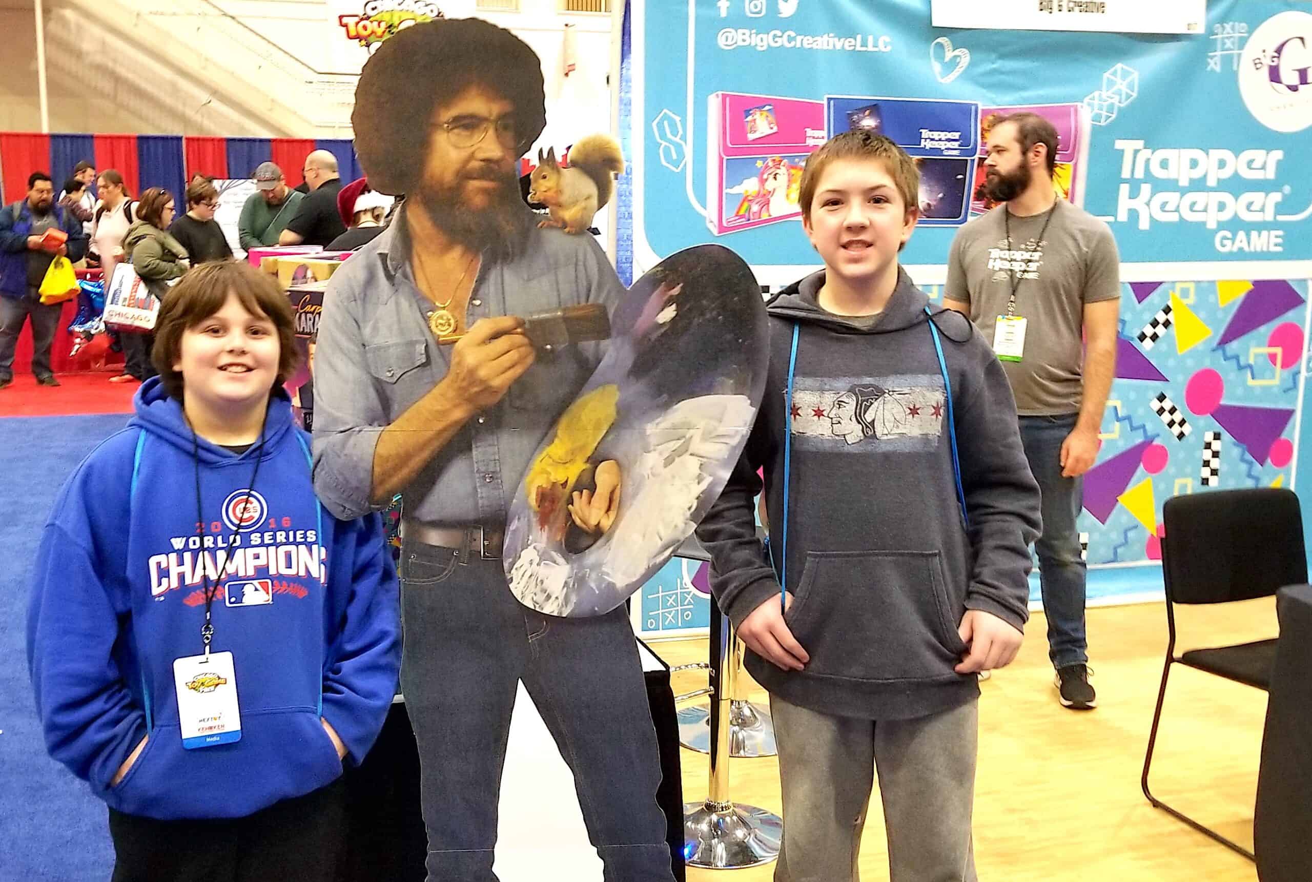 teen boys with Bob Ross cutout