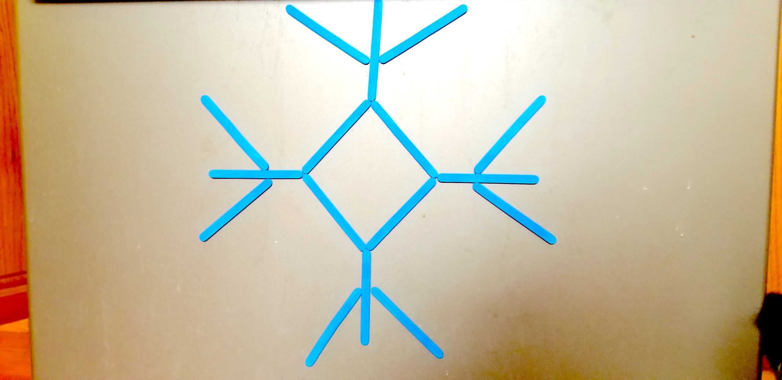 Symmetrical Snowflake Craft Stick Magnetic Activity + Printables