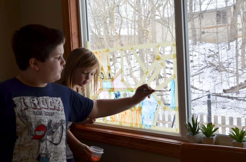 kids painting windows