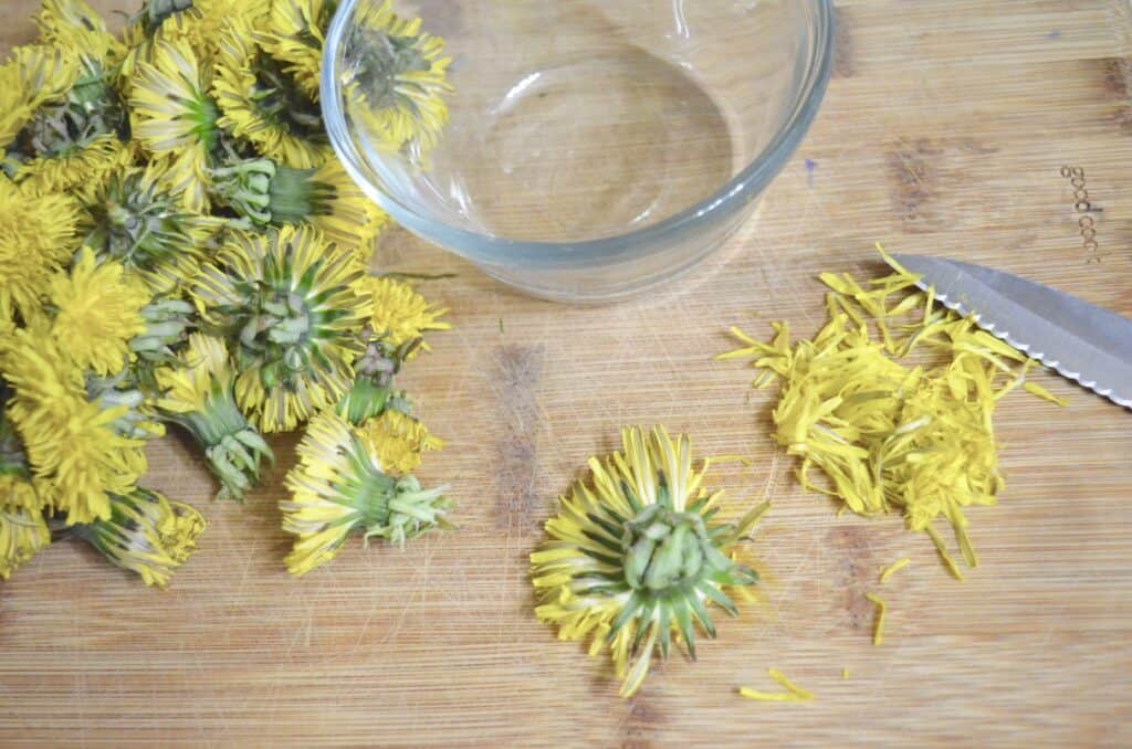 cutting dandelion flower petals